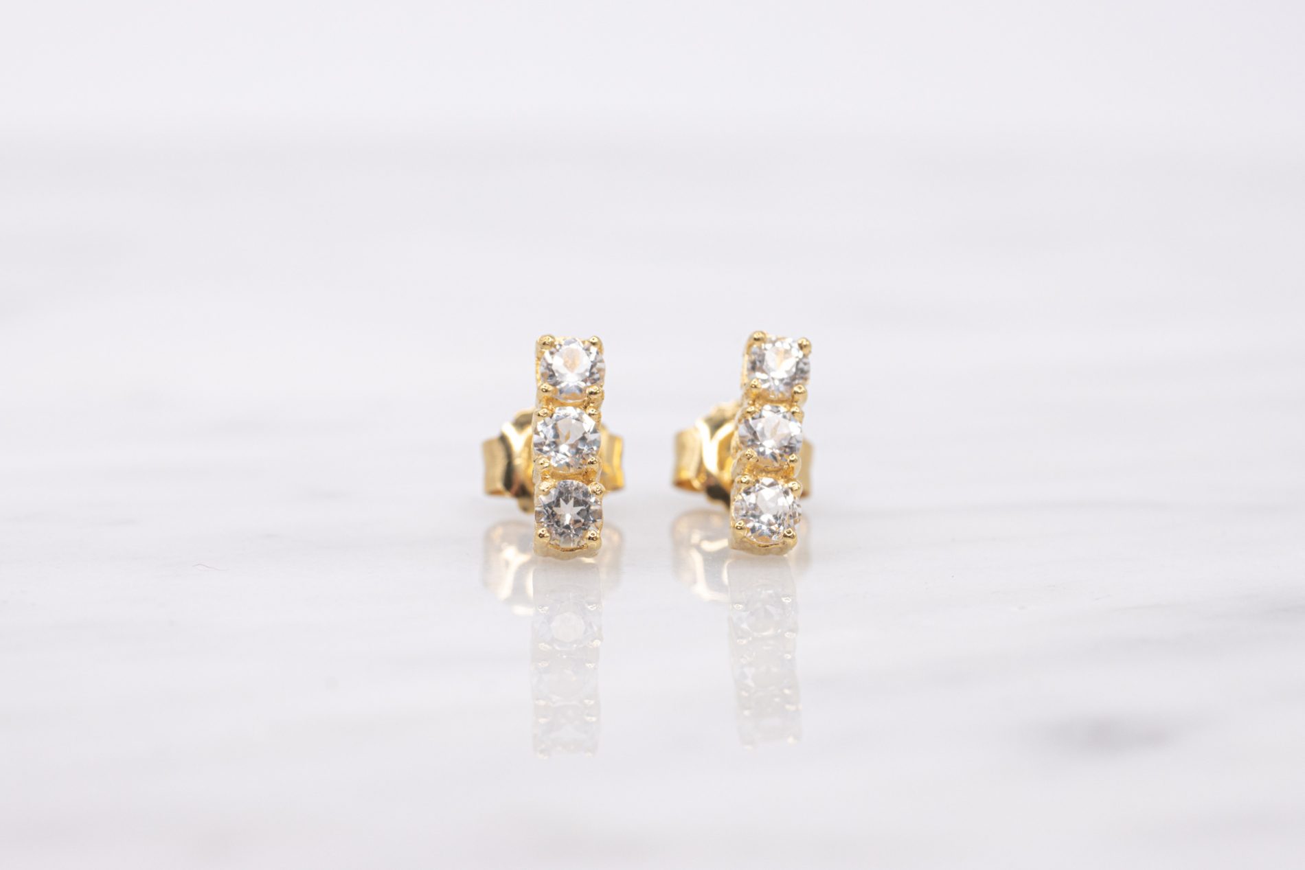 Aretes Trilogy Topacio Blanco