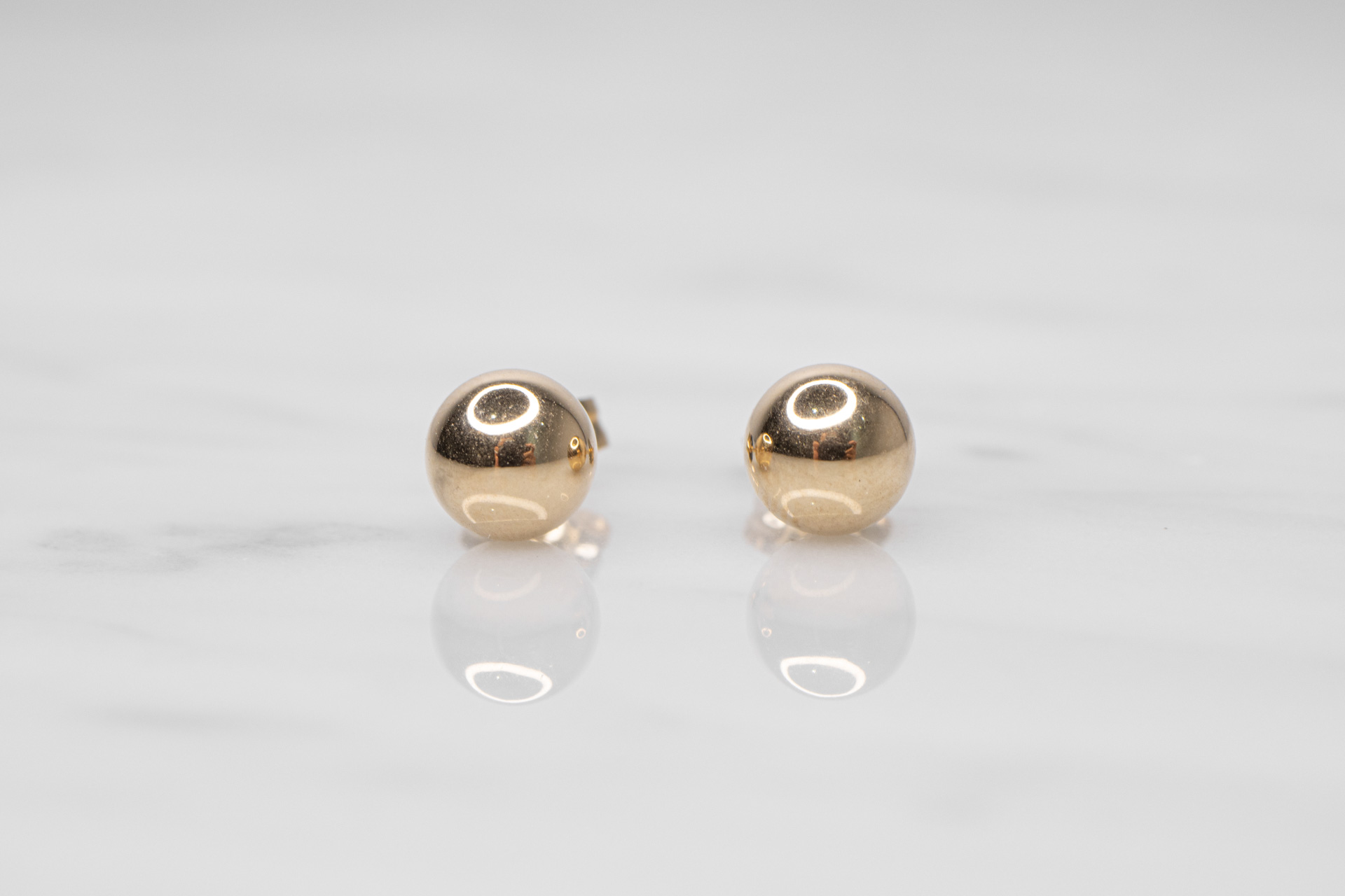 Aretes Punto de Luz